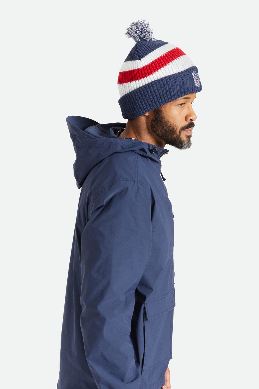 
       Brixton Kit Pom Beanie - Washed Navy/White/Red
     