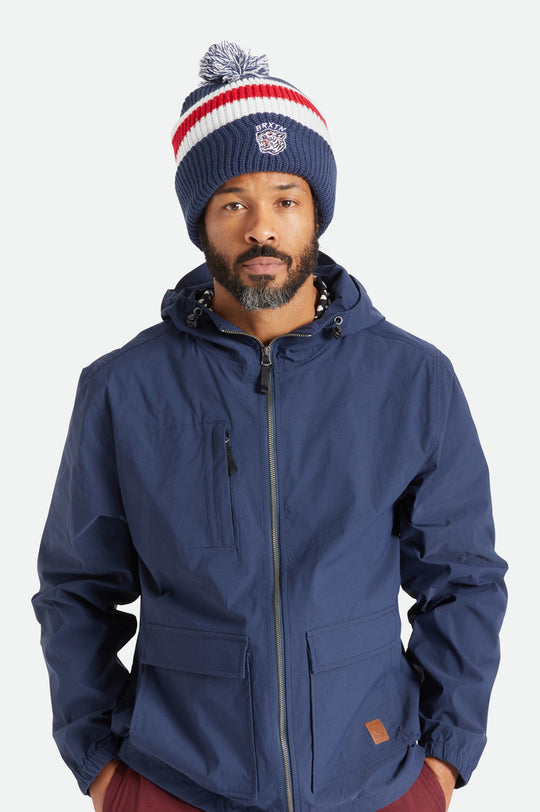 
       Brixton Kit Pom Beanie - Washed Navy/White/Red
     